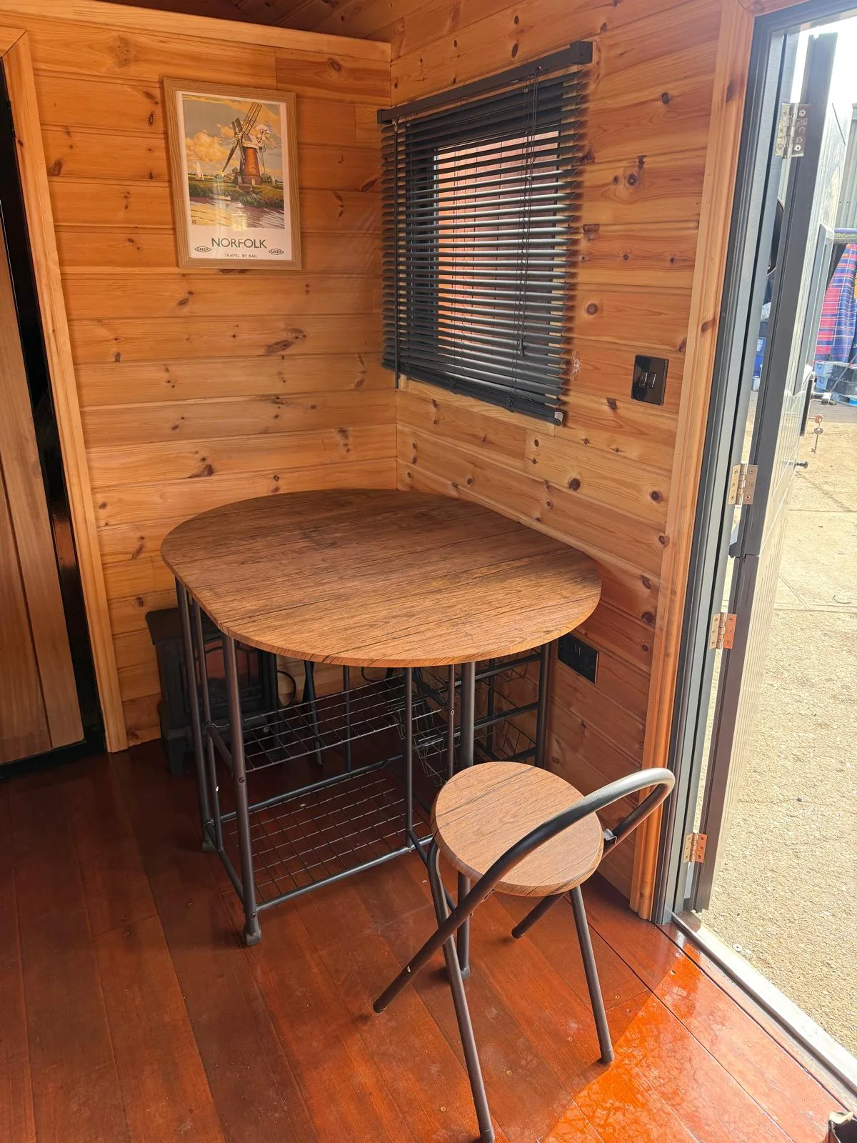 Table and chairs inside the railway carriage