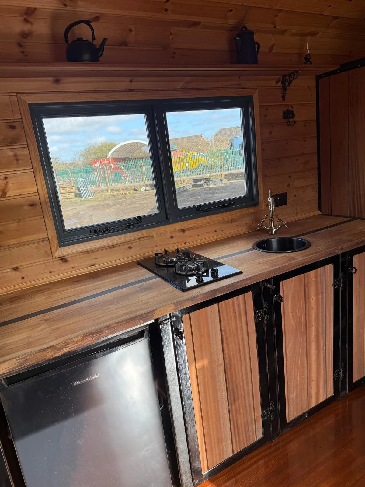 Fitted kitchen inside the railway carriage